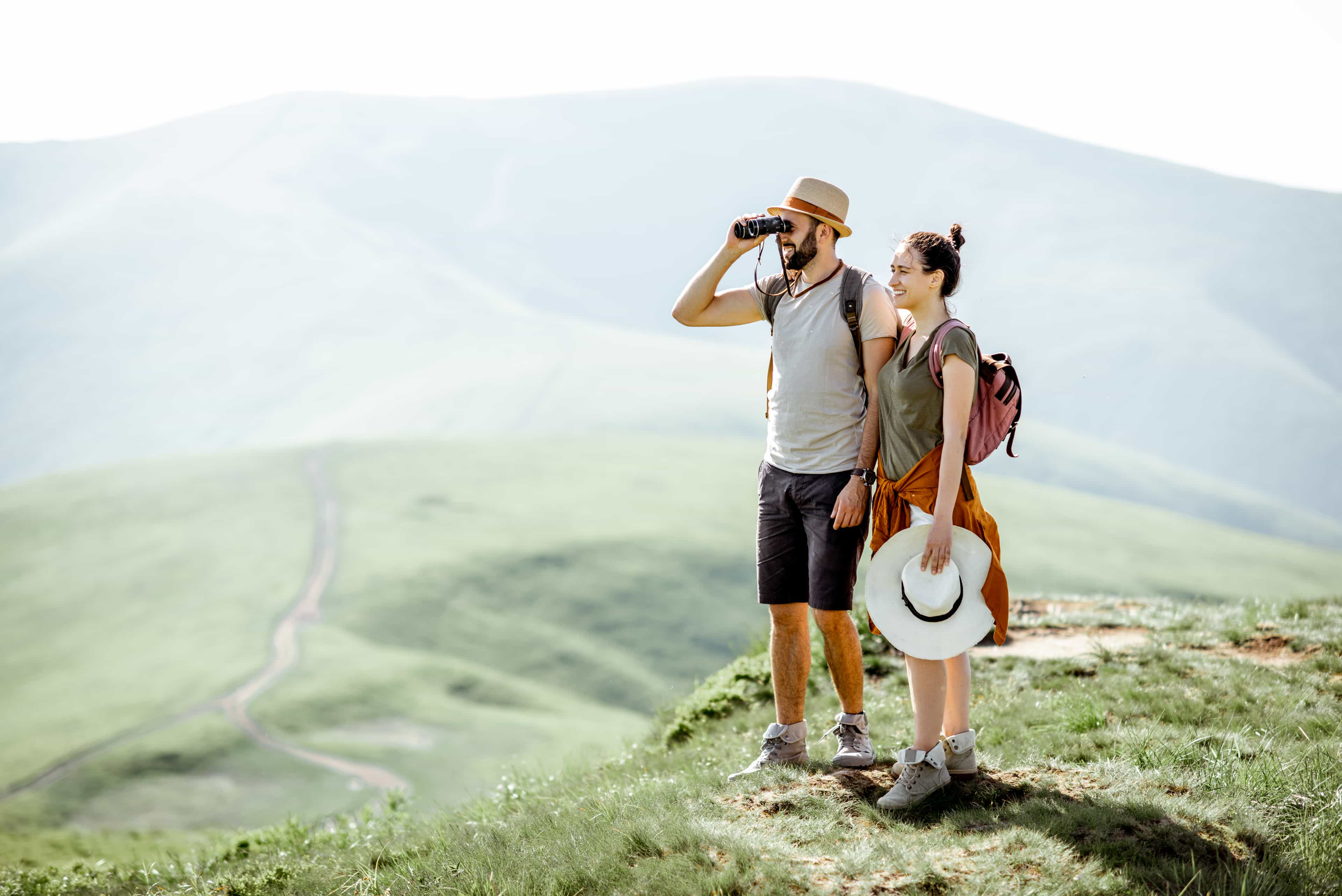 Couple looking on mountain